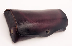 Glasses case with popper